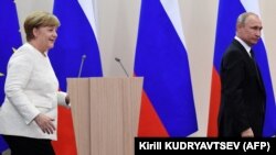 Канцлер Німеччини Анґела Меркель і президент Росії Володимир Путін, Сочі, 18 травня 2018 року