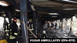 AZERBAIJAN FIRE DRUG ABUSE CENTER -- Azerbaijani firefighters at the site of a fire in the republican drug rehabilitation center in Baku, Azerbaijan, 02 March 2018. Media reports state that the death toll increased to 25 people from the fire that had occ